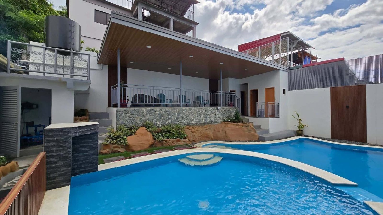 Pool and resort house view